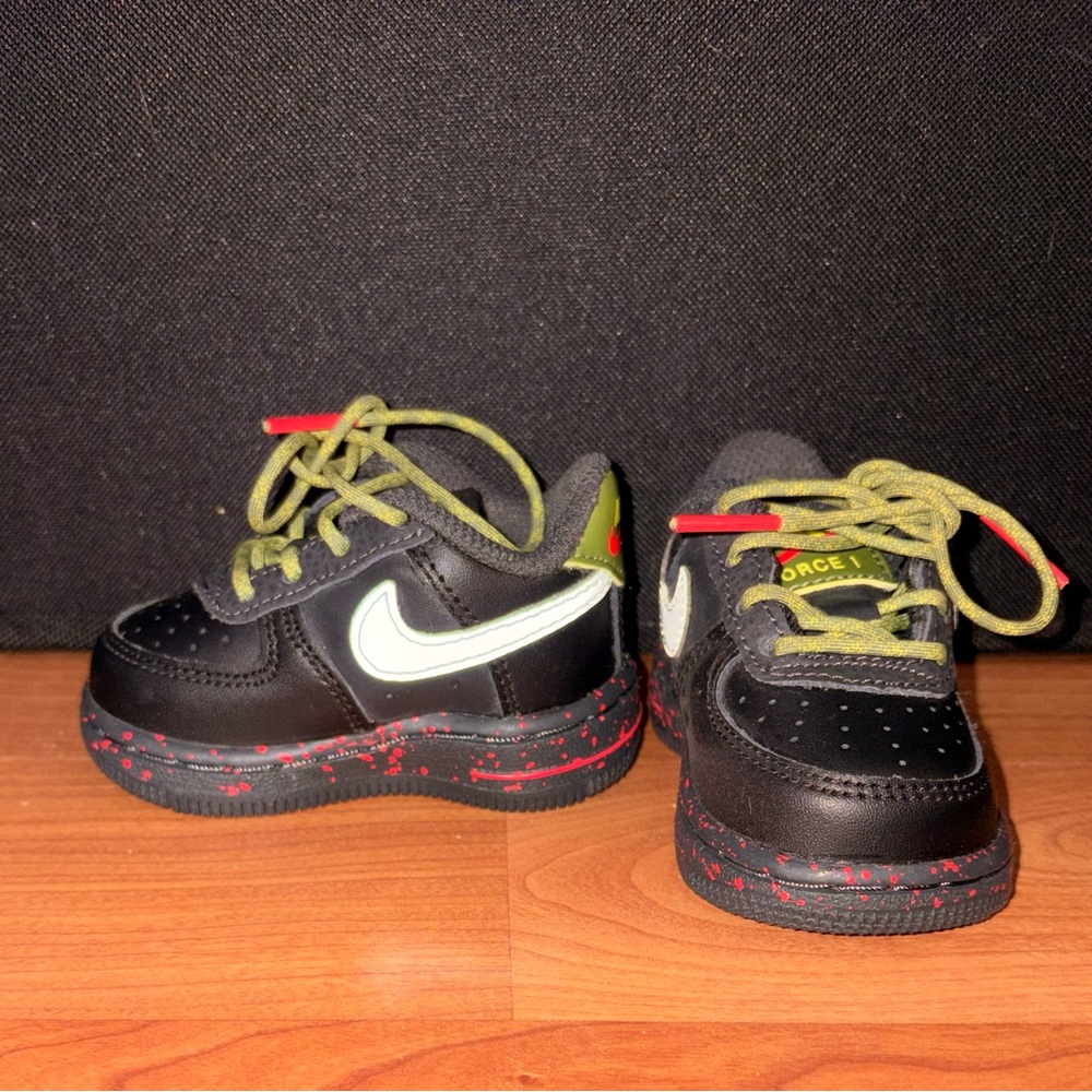 Nike Kids Black Sneakers with Green and Red Accents
